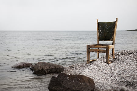 brown, wooden, armless, chair, near, sea, daytime