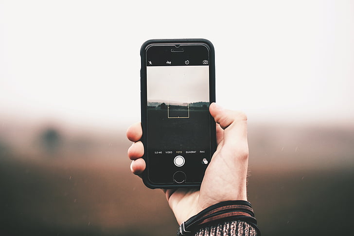 Foto, persoană, Holding, smartphone, luând, pingint, iPhone