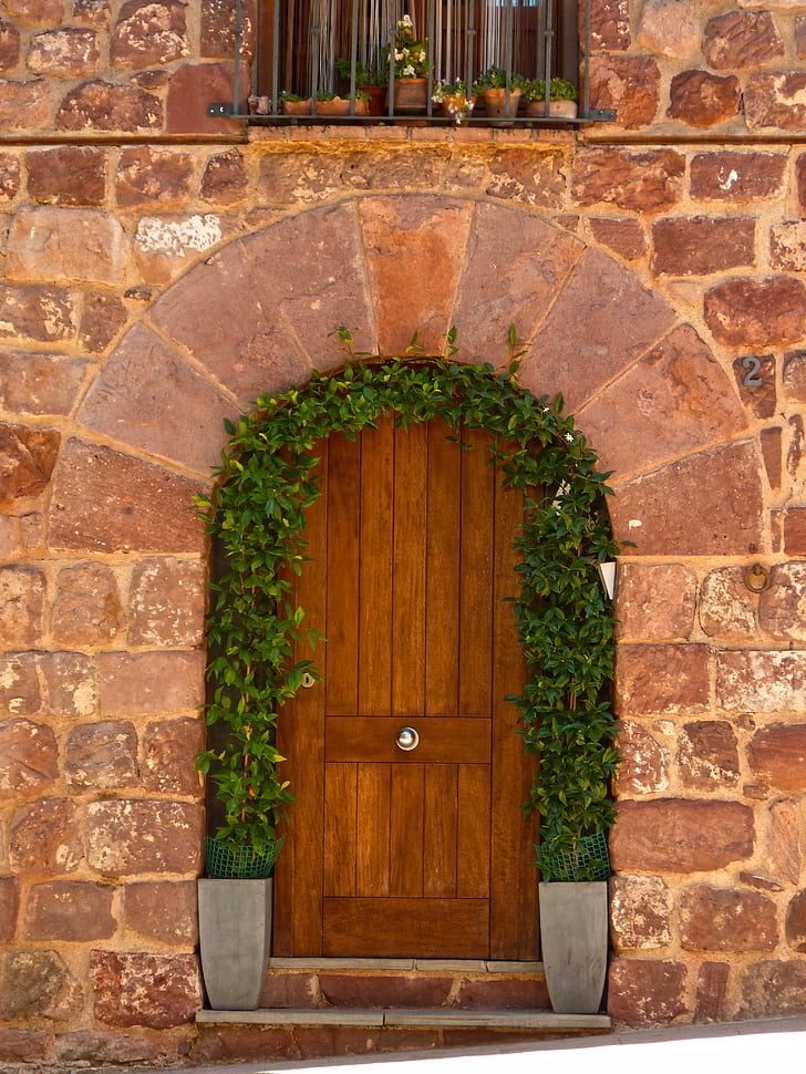 door, arch, carved stone, prades, popular architecture, red sandstone, tools