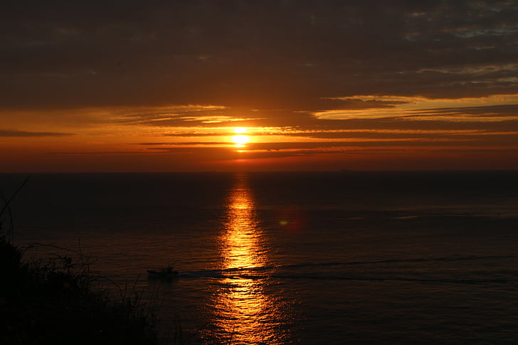 izlazak sunca, more