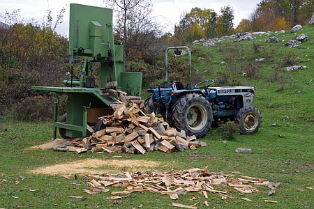 wood, logs of wood, tractor, power saw, lumber, trunks of trees, pile of wood