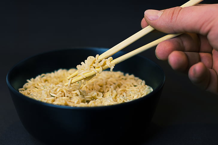 person, holding, chopstick, noddles, bowl, noodles, soup