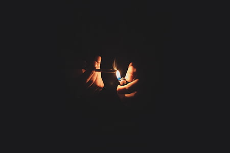 person, holding, blunt, lighted, lighter, fire, flame
