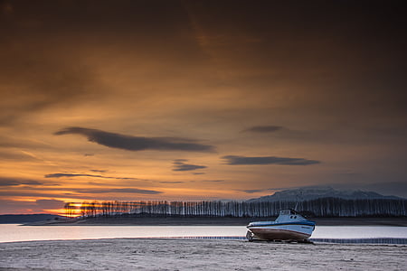 sunset over the lake, sunset, lake, boat, fishing boat, water, sky