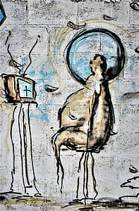 moderne mens, televisie, hersenspoelen, apathie, passiviteit, graffiti
