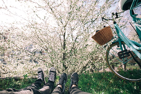 bicycle, bike, feet, flowers, footwear, grass, nature