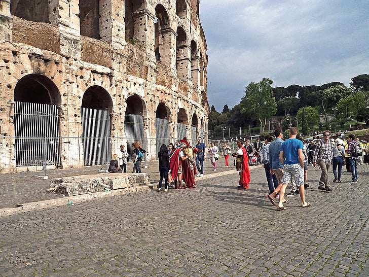 the coliseum, people, guards, ice, ancient times, rome, italy