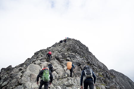 group, person, hiking, mountain, daytime, peak, stones