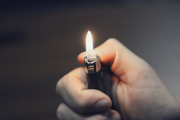 photo, person, lighting, lighter, fire, flame, hands