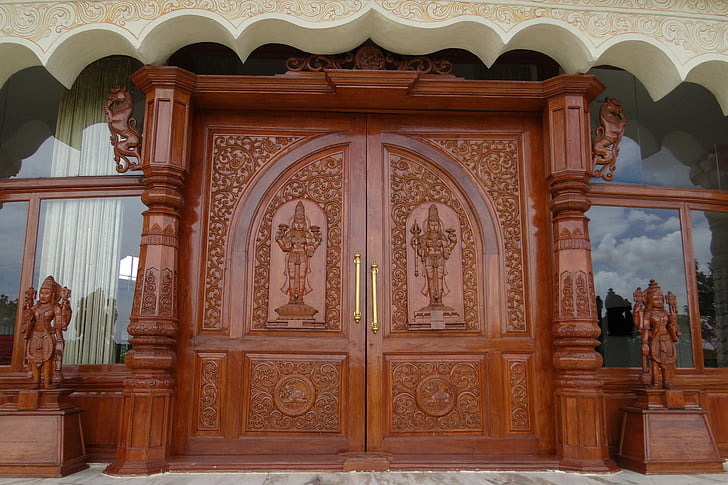 ornate door, wooden, carved, art of living, international center, yoga, spirituality