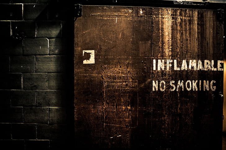 inflamable, smoking, wall, signage, written, brown, caution