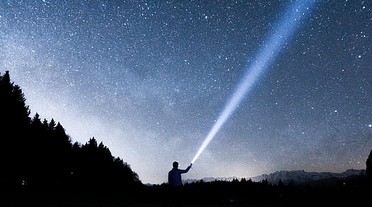 person, using, flashlight, facing, stars, dark, night