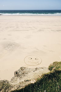 smiley, face, drawn, white, sand, near, cliff