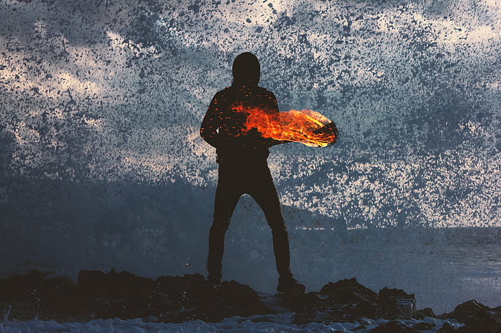 person, holding, torch, fire, spray, wave, silhouette