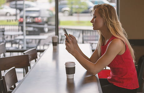 woman, sitting, counter, phone, smartphone, female, coffee