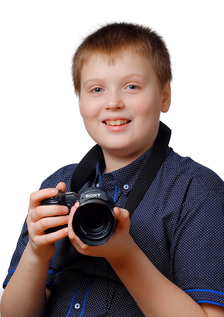 skolpojke, Fotoklubben, fotoshkola, fotograf, kameran, innehar, Porträtt av barn