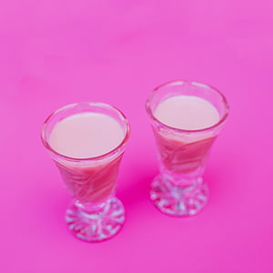 two, shot, glasses, filled, beige, liquids, pink