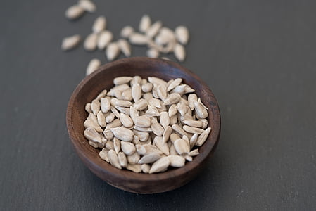 sementes de girassol, núcleos, sementes de girassol sem casca, produto natural, lanche, comida, saudável