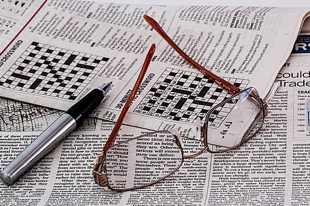 crossword, eyeglasses, eyewear, newspaper, pen, puzzle