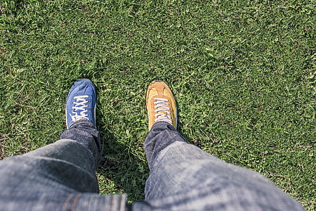 person, blue, jeans, two, different, sneakers, standing