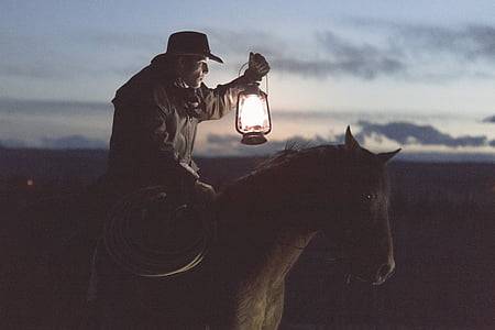 man, riding, horse, holding, lantern, lamp, rope