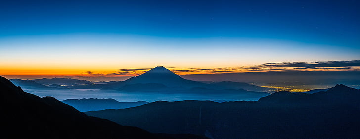 panoramic landscape, mt fuji, before dawn, silence, at the foot of the town the lights of the, fujinomiya, japan
