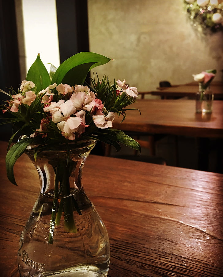 cafe, a small bottle, flower-design table, flower, vase, table, bouquet