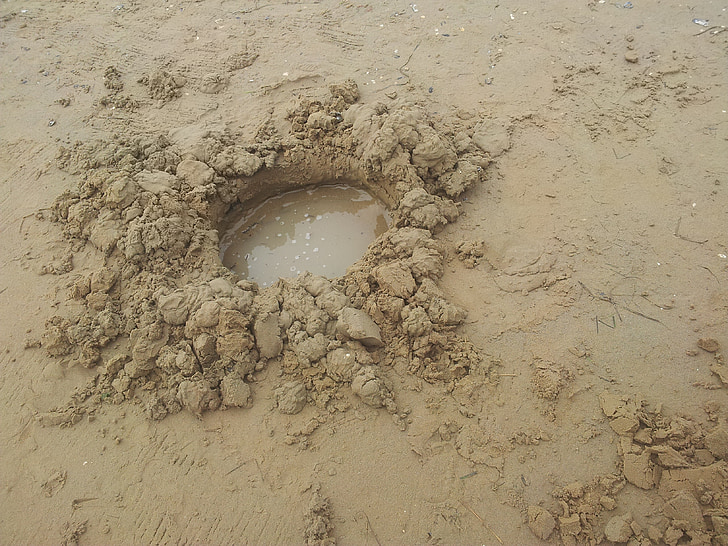 areia, Buca, buracos