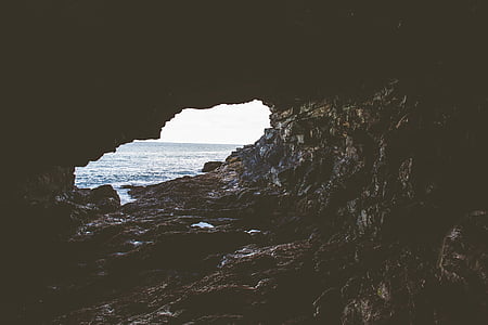brown, cave, near, body, water, rocks, coast