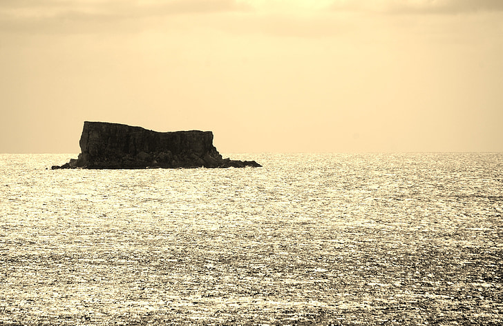 klints, jūra, saulriets