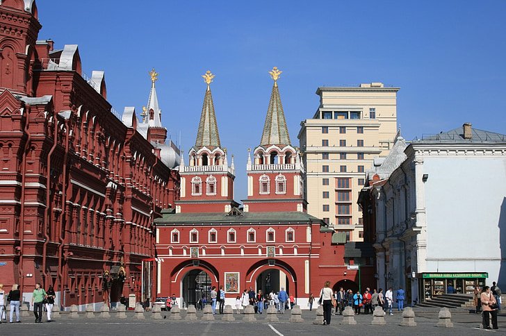 entrance, twin gates, twin towers, red, white trimmings, red square, paving