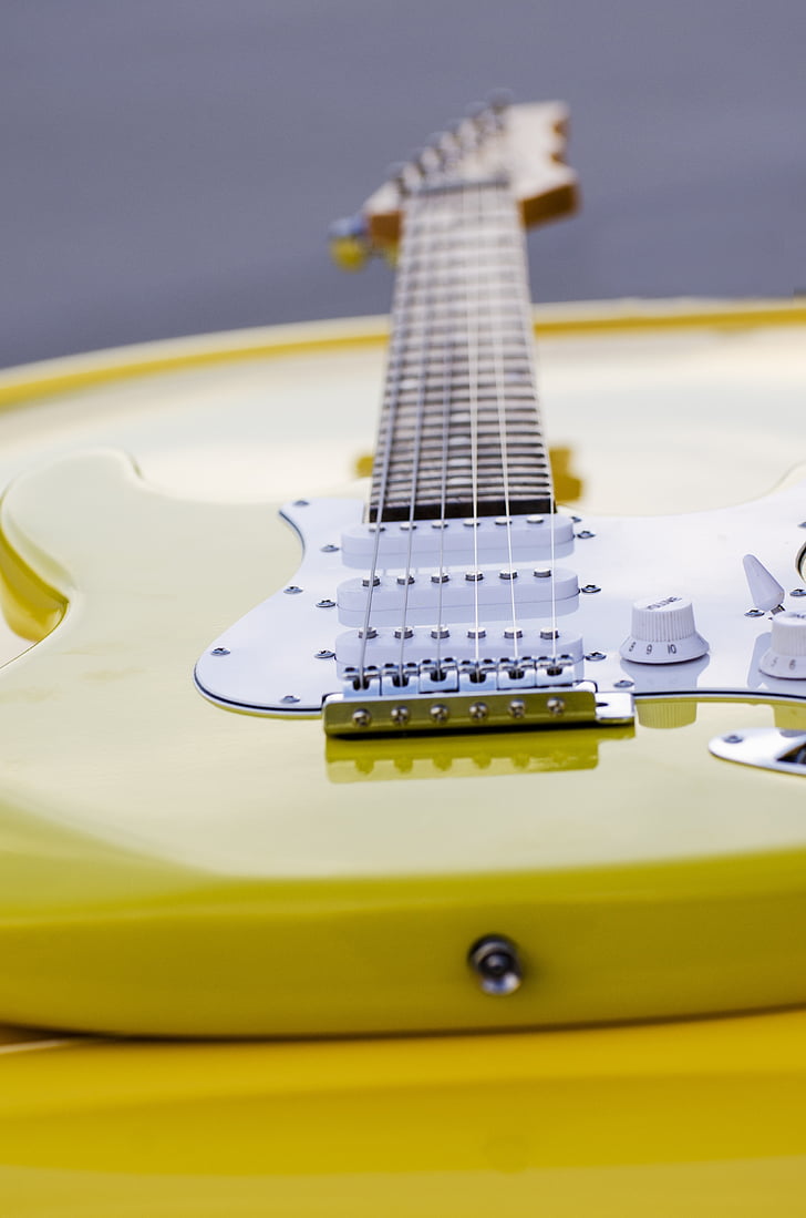 electric guitar, canary yellow, guitar, perspective, music, electric, instrument