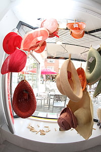 hats, fashion, window, hat, indoors, food and drink, no people