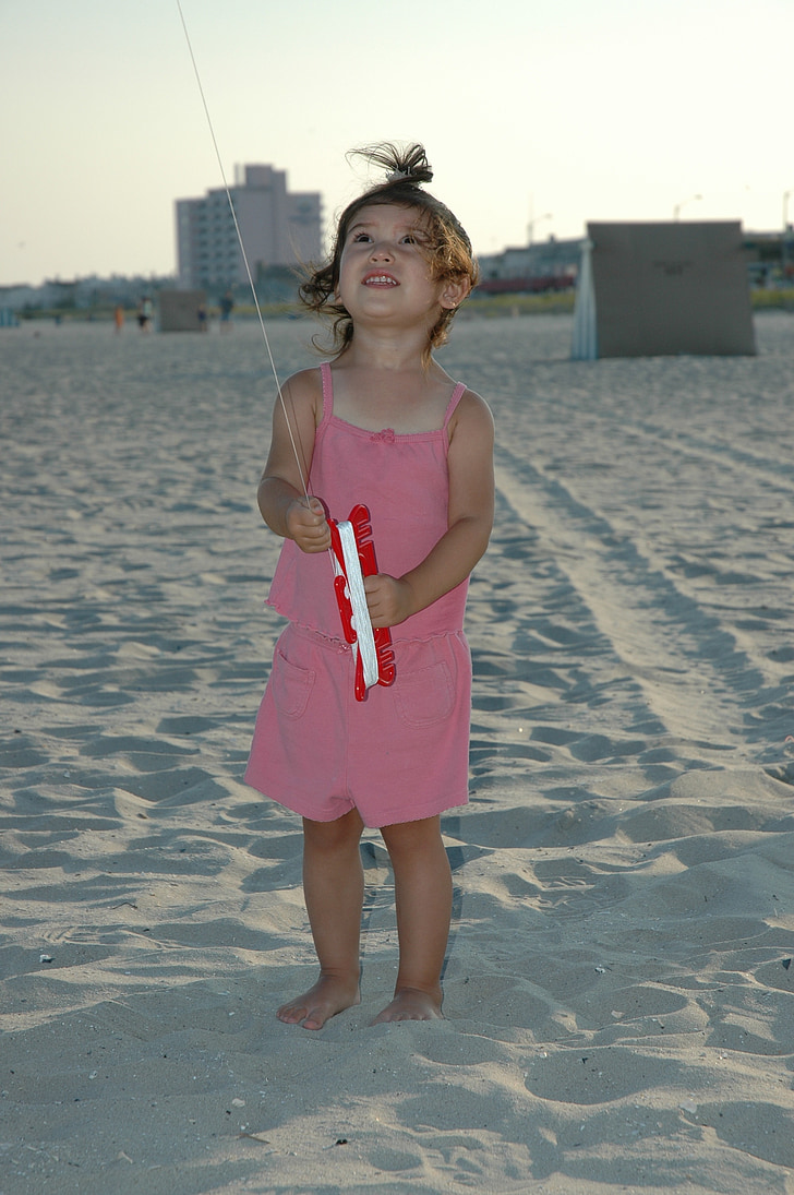 child, beach, kite, play, joy, looking up, girl