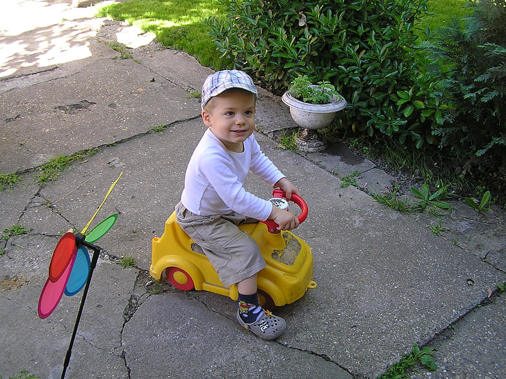 little boy, moped, garden