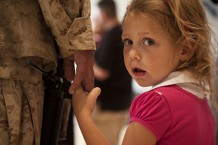 soldier, daughter, child, looking, face, holding hands, family