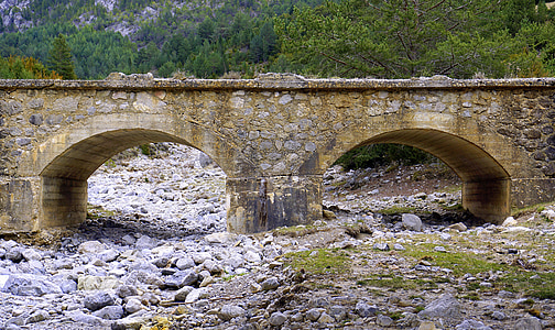 old bridge, dry torrent, stones, river bed, rocks, textures, forms