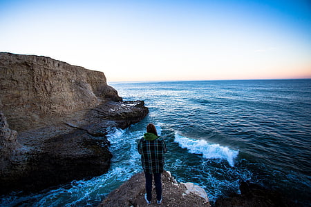 man, standing, top, cliff, facing, ocean, nature