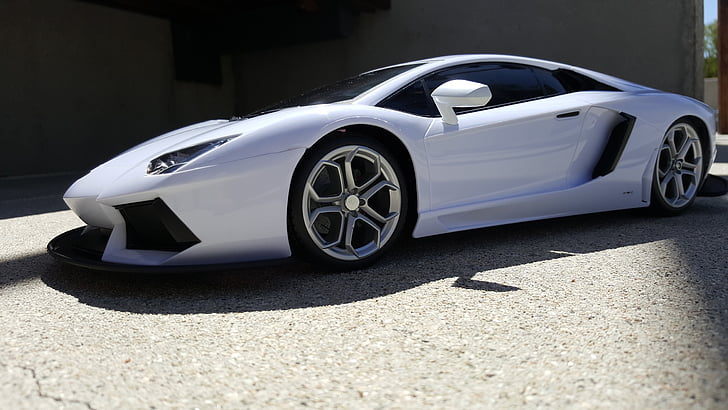 ferrari toy car, white car, close up, angle shot, auto, car, angled