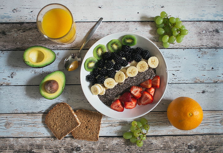 avocado, bread, food, fruits, orange, rustic, wooden table