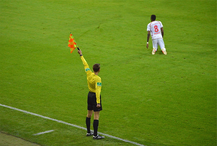 soccer, referee, holding, orange, yellow, stripe, flag