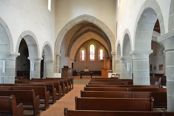 church, benches, rows of benches, plenty of natural light, gothic style, vault, rustic