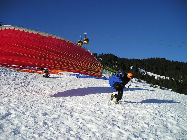 paragliding, start, elevator phase, pull up, take off, winter, paraglider
