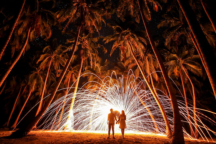 man, women, standing, coconut, trees, light, fountain