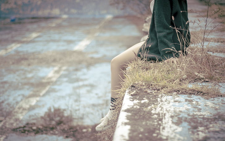 person, sitting, waiting, legs, sweater, perched, outdoors