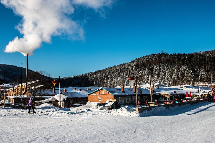 village, snow, blue sky