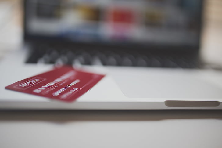 person, taking, photo, red, card, white, laptop