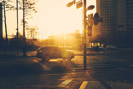 car, city, crosswalk, street, sunset, traffic