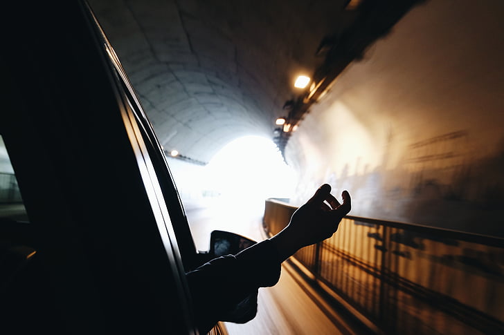 car, hand, person, ride, tunnel, underground, one Person