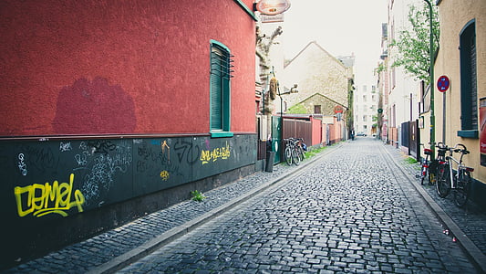 cobblestone, street, sidewalk, graffiti, wall, houses, town